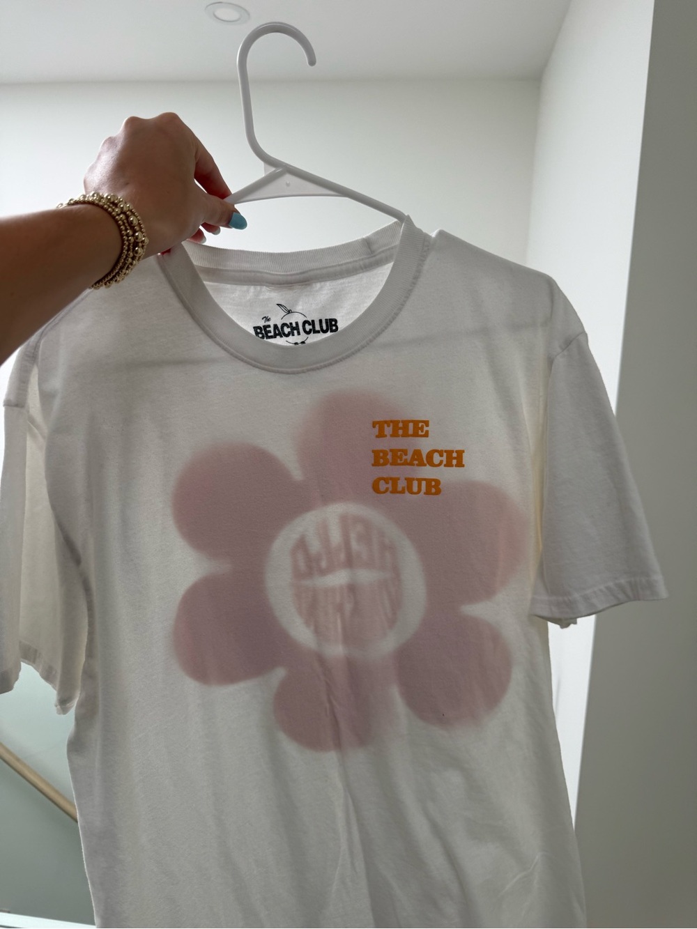 The Beach Club White T-Shirt with Orange Floral Graphic